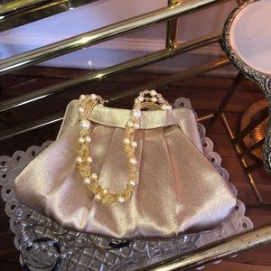 Vintage style beige clutch with beaded pearl strap